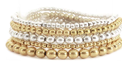 Worn Gold and Silver Bracelet Set